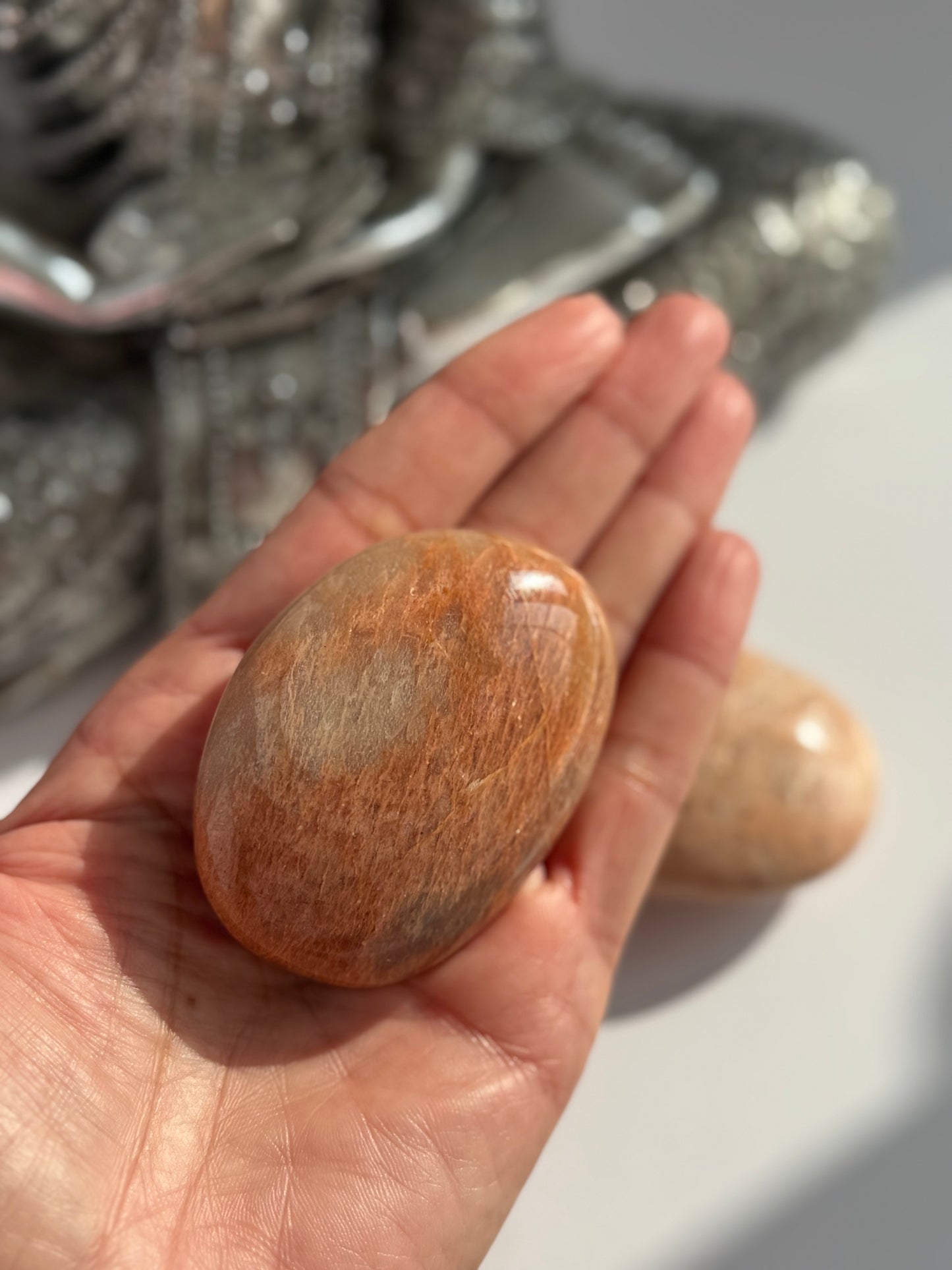 Peach moonstone crystal palmstone 6cm 1 count